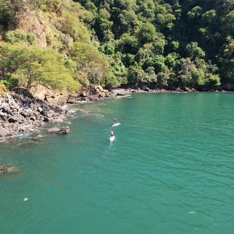 The turquoise bay and jungle cliffs of the islands of La Union, El Salvador